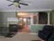 Comfortable living room, leads to a kitchen, dining area and staircase at 106 Trailside Way, Hiram, GA 30141