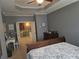 Main bedroom featuring trey ceiling, neutral walls, and access to an ensuite bathroom at 106 Trailside Way, Hiram, GA 30141