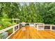 Wooden back deck with grill, perfect for outdoor entertaining at 1061 Polo Club Nw Dr, Marietta, GA 30064