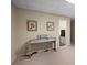 A finished basement featuring an electronic piano, neutral walls, and adjacent bathroom at 1061 Polo Club Nw Dr, Marietta, GA 30064