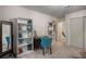 Bright bedroom shows shelving and desk plus open door to staircase at 1061 Polo Club Nw Dr, Marietta, GA 30064