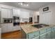 Spacious kitchen with double wall ovens, granite countertops, and a functional island at 1061 Polo Club Nw Dr, Marietta, GA 30064