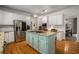 Well-appointed kitchen featuring stainless steel appliances, granite countertops, and a functional island at 1061 Polo Club Nw Dr, Marietta, GA 30064