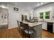 Beautiful kitchen with island, granite countertops, stainless appliances, and hardwood floors at 1061 Polo Club Nw Dr, Marietta, GA 30064