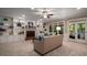 Spacious living room with fireplace, built-in shelving, plush seating, and ample natural light at 1061 Polo Club Nw Dr, Marietta, GA 30064