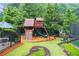 Community playground with slide, climbing wall, and picnic area at 1061 Polo Club Nw Dr, Marietta, GA 30064