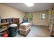 Organized storage area with shelving, cabinets, storage container and ladder at 1061 Polo Club Nw Dr, Marietta, GA 30064