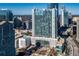 High-rise building featuring luxurious condos with a pool and stunning city skyline views at 3324 Peachtree Ne Rd # 1407, Atlanta, GA 30326
