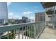 Balcony overlooking city buildings with metal railing on a partly cloudy day at 3324 Peachtree Ne Rd # 1407, Atlanta, GA 30326