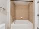 Bathroom featuring a bathtub with tiled walls at 3324 Peachtree Ne Rd # 1407, Atlanta, GA 30326