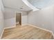 Bright, empty bedroom with laminate floors and a walk-in closet at 3324 Peachtree Ne Rd # 1407, Atlanta, GA 30326
