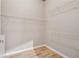 Walk-in closet with wood-look floors and shelving for optimal storage at 3324 Peachtree Ne Rd # 1407, Atlanta, GA 30326