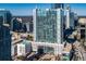 Modern high-rise exterior with glass balconies, city views, and a pool for luxury living in an urban setting at 3324 Peachtree Ne Rd # 1407, Atlanta, GA 30326