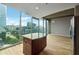 Kitchen island with granite countertops and cityscape view at 3324 Peachtree Ne Rd # 1407, Atlanta, GA 30326