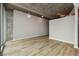 Bright living area with neutral walls, wood floors, and modern lighting perfect for comfortable living at 3324 Peachtree Ne Rd # 1407, Atlanta, GA 30326
