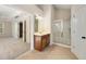 Bright bathroom featuring single vanity with wood cabinets, tile flooring, and glass enclosed shower at 516 Winder Trl, Canton, GA 30114