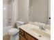 Bathroom showcasing a vanity with drawers, a sink, a mirror, a toilet, and a shower with a bathtub at 516 Winder Trl, Canton, GA 30114