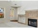 Bright living room with soaring ceilings, fireplace and large windows at 516 Winder Trl, Canton, GA 30114