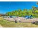 Playground featuring multiple slides, jungle gym, swings, and a covered picnic area at 516 Winder Trl, Canton, GA 30114