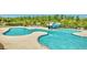 Community pool with slide, lifeguard chairs, and a large tanning area at 516 Winder Trl, Canton, GA 30114
