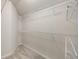 A carpeted walk-in closet featuring white wire shelving at 516 Winder Trl, Canton, GA 30114