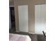 Bedroom featuring folding closet doors and neutral carpeting at 636 North Ave # H-10, Jonesboro, GA 30236