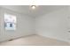 Clean, bright bedroom with a window at 325 Cranbrooke Cir, Suwanee, GA 30024