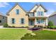 Charming brick home with well-manicured lawn and inviting blue front door at 325 Cranbrooke Cir, Suwanee, GA 30024