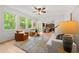 Inviting living room with comfortable seating and ample natural light at 325 Cranbrooke Cir, Suwanee, GA 30024