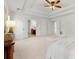Spacious main bedroom with ensuite bath and closet access, plus neutral décor at 325 Cranbrooke Cir, Suwanee, GA 30024
