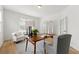 Bright office space featuring neutral walls, modern decor, lots of light, and hardwood floors at 325 Cranbrooke Cir, Suwanee, GA 30024