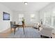 Office space featuring neutral walls, modern decor, lots of light, and hardwood floors at 325 Cranbrooke Cir, Suwanee, GA 30024