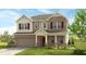 Charming two-story home featuring a brick facade, covered entrance, and well-manicured lawn at 3279 Shirecrest Ln, Dacula, GA 30019