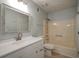 Bathroom featuring modern fixtures, updated vanity, and a shower-tub combo at 3563 Brenda Ct, Douglasville, GA 30135