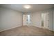 Bedroom featuring wall-to-wall carpet and access to the home's other spaces at 3563 Brenda Ct, Douglasville, GA 30135