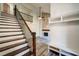 View of entry showing staircase and fireplace feature in the living room at 3563 Brenda Ct, Douglasville, GA 30135