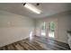 Renovated kitchen features granite counters, subway tile, and access to backyard at 3563 Brenda Ct, Douglasville, GA 30135