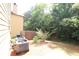 Backyard with AC units next to a neighboring building at 3877 Lake Sanctuary Way, Atlanta, GA 30349