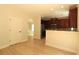 Eat-in kitchen with cherry cabinets, granite countertops, and stainless steel appliances at 3877 Lake Sanctuary Way, Atlanta, GA 30349