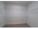 Ample space for clothing and storage in this walk-in closet at 3877 Lake Sanctuary Way, Atlanta, GA 30349