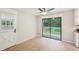 Kitchen nook with light tile flooring, ceiling fan, and sliding glass doors to the yard at 5259 Sugar Ridge Dr, Sugar Hill, GA 30518