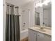 Clean bathroom featuring a shower-tub combo, vanity with sink, and neutral color scheme at 800 Peachtree Ne St # 8429, Atlanta, GA 30308