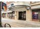 Modern building entrance with glass doors and a prominent address number, offering a welcoming facade at 800 Peachtree Ne St # 8429, Atlanta, GA 30308