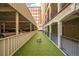 Outdoor dog run area with artificial turf and convenient access to parking and building amenities at 800 Peachtree Ne St # 8429, Atlanta, GA 30308