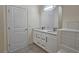 This bathroom offers double sinks, sleek vanity and hardware, and tile flooring at 870 Mayson Turner Nw Rd # 1447, Atlanta, GA 30314