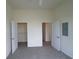 This bedroom features a walk-in closet, neutral walls, and carpet floors at 870 Mayson Turner Nw Rd # 1447, Atlanta, GA 30314