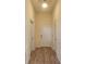 Entryway with wood floors, white walls, and two white doors at 870 Mayson Turner Nw Rd # 1447, Atlanta, GA 30314
