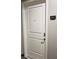 Entry to unit 1447 with white paneled door and brushed metal hardware at 870 Mayson Turner Nw Rd # 1447, Atlanta, GA 30314