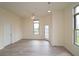 Bright living room with wood floors, ceiling fan, and balcony access at 870 Mayson Turner Nw Rd # 1447, Atlanta, GA 30314