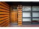 Inviting front door with unique vertical address display and natural wood accents near window at 1605 Ezra Church Nw Dr, Atlanta, GA 30314
